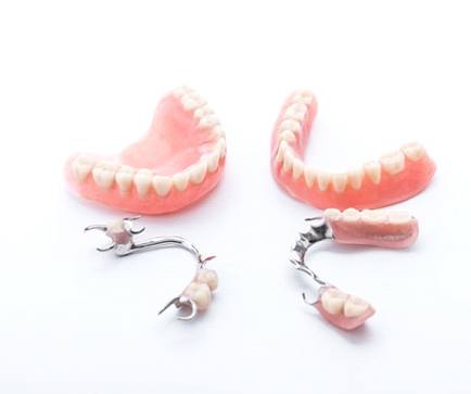 two full dentures and two partials