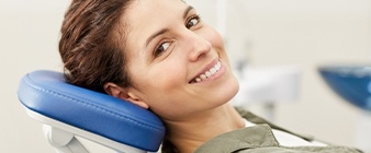 Smiling woman in dental chair