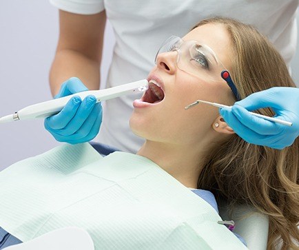 Dentist capturing intraoral images