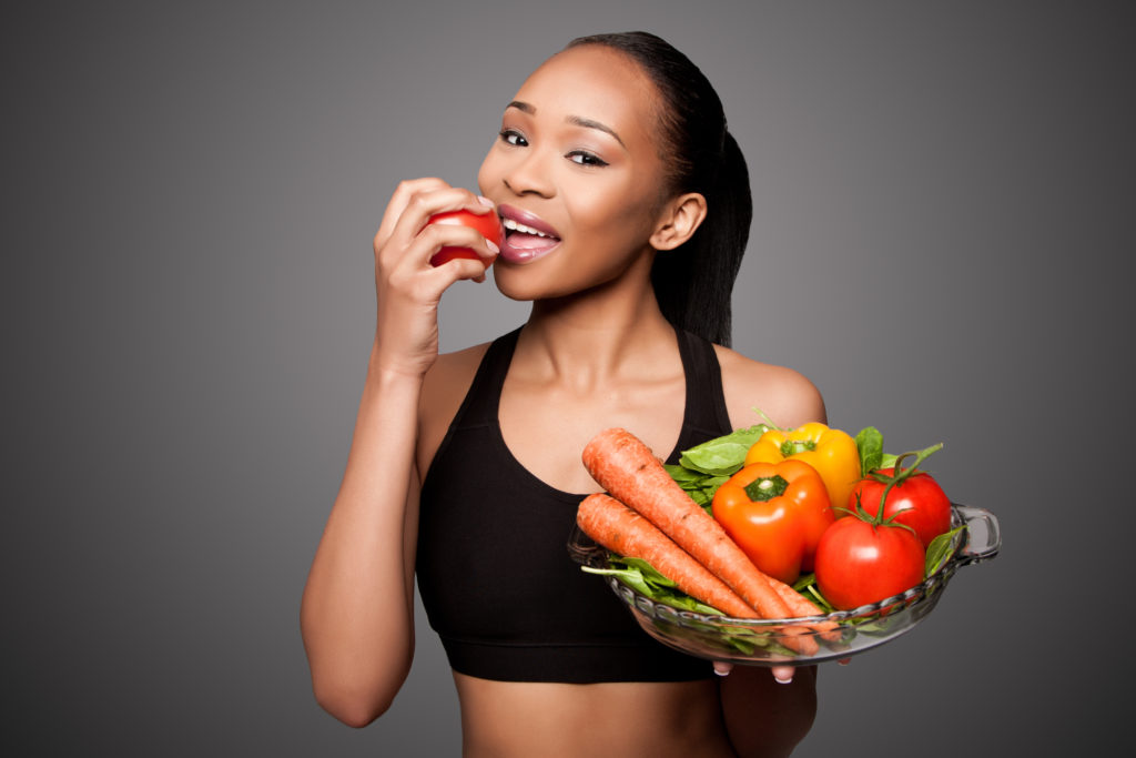 fit woman bowl of healthy snacks