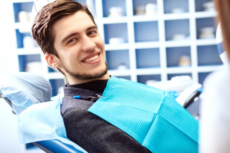 young man happy after visiting dentist in mount vernon