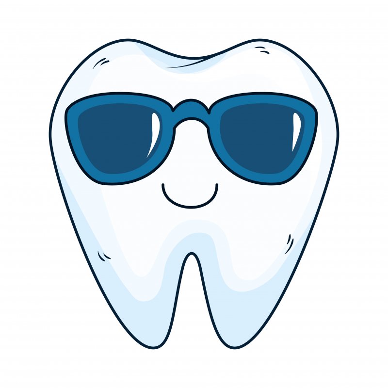 Comic tooth with sunglasses