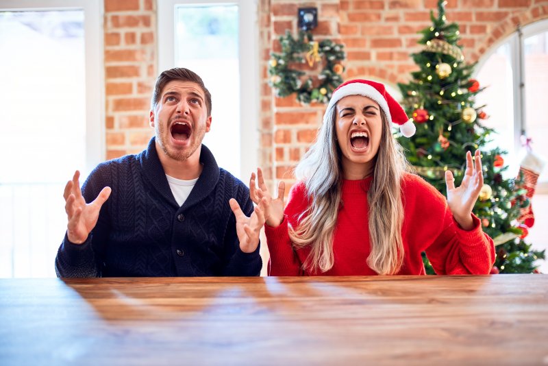 a couple yelling due to holiday stress